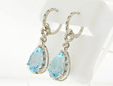 Sterling Silver Women's Genuine Blue Topaz Tear Drop Diamond Earrings
